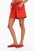 Shorts in printed cotton with front flaps